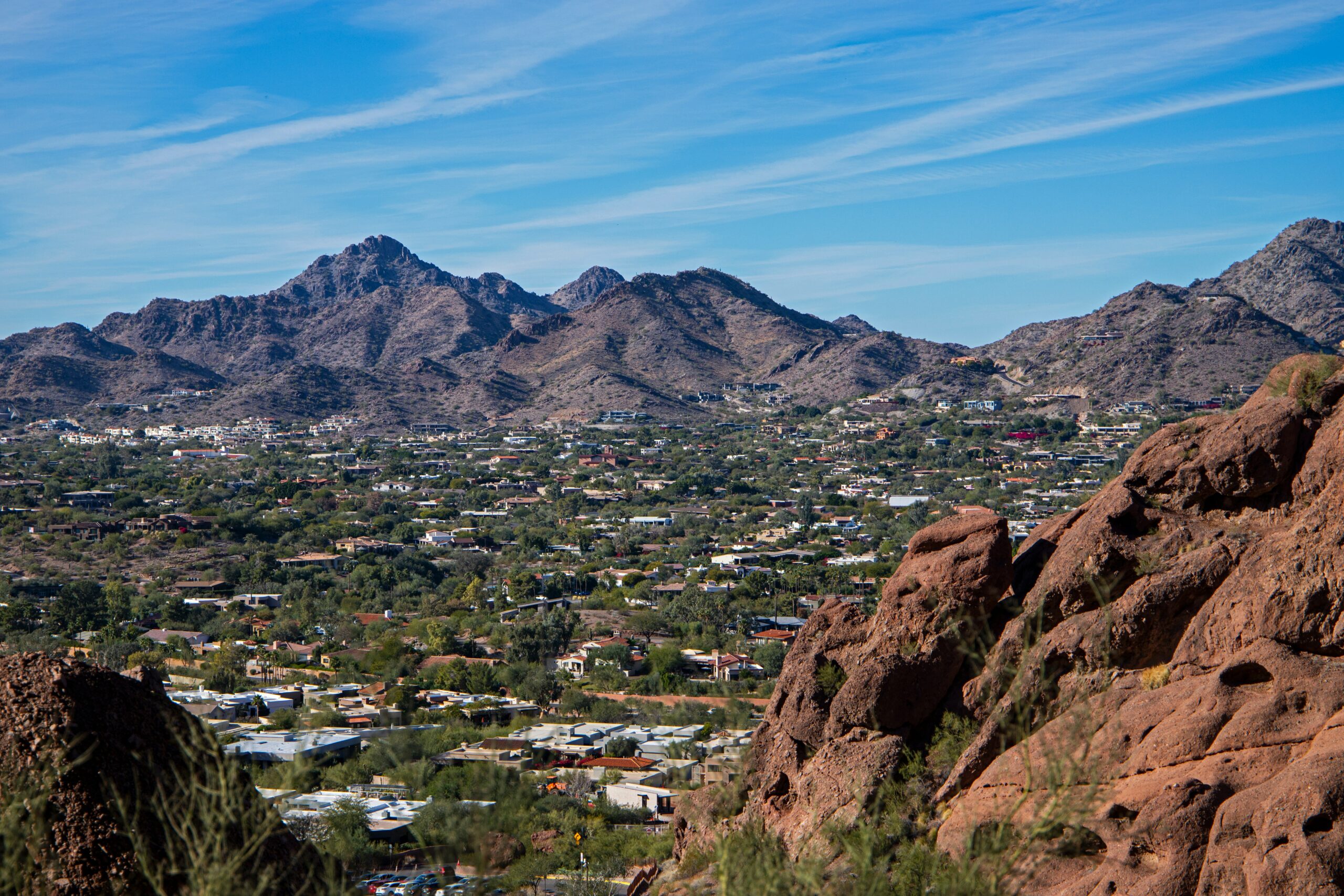 Aerial view of the McDowell Mountains and North Scottsdale neighborhoods, highlighting the desert landscape for California homebuyers.